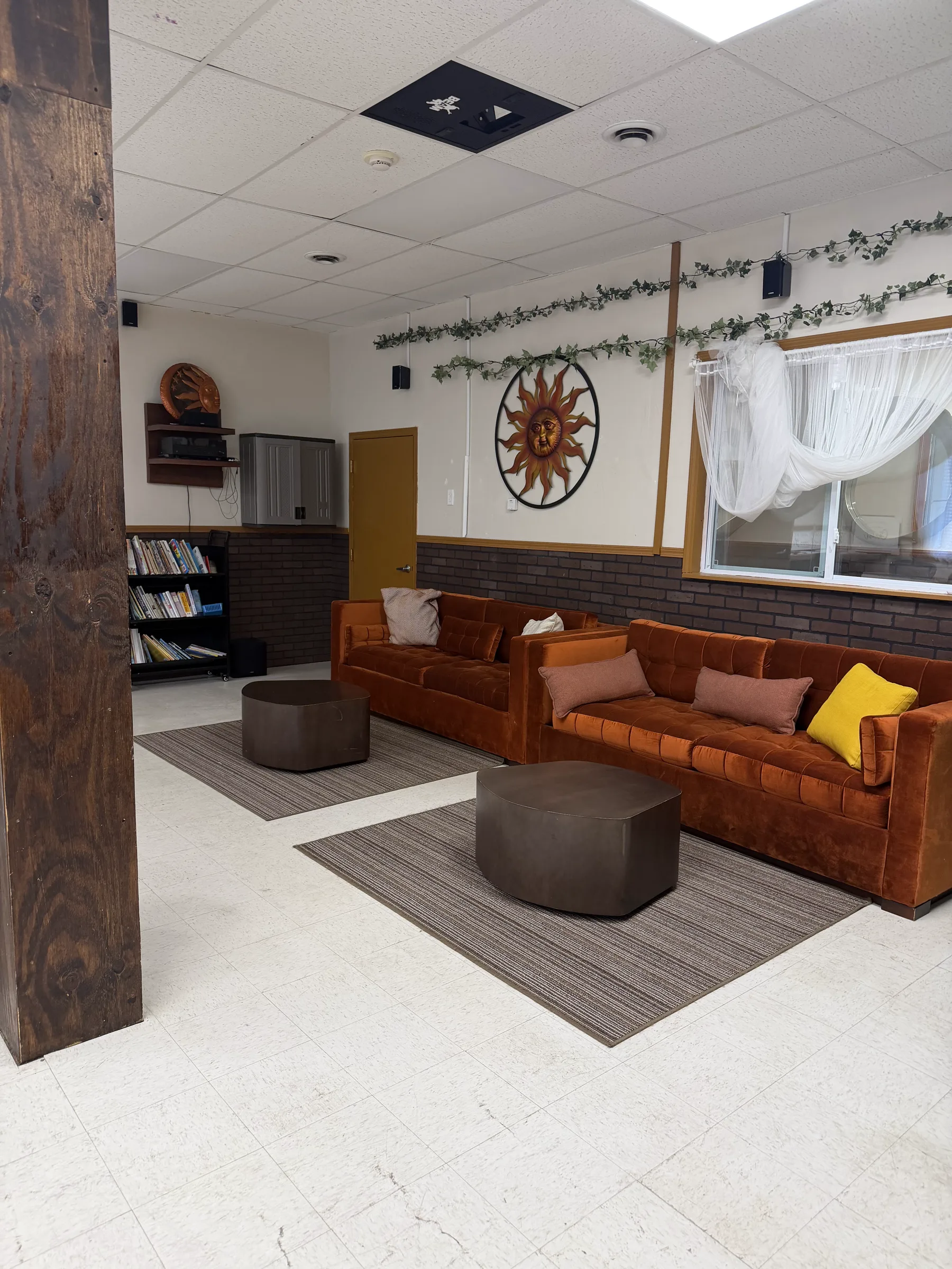Furnished lounge and coworking area inside the 5 Star Impact facility.